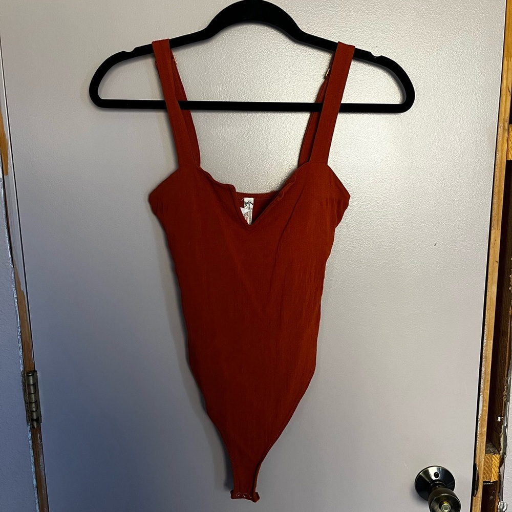 Burnt orange free people v bodysuit